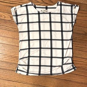 White and Black Blouse. Short Sleeve. Size Medium. Cute detail and pattern!